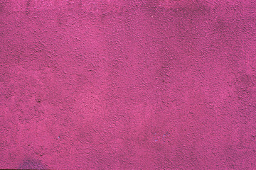 Pink plastered wall for background use.