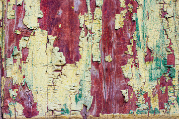 Texture with old wooden painted and peeled surface.