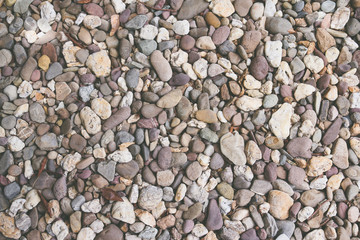 Pebbles or river stone background 