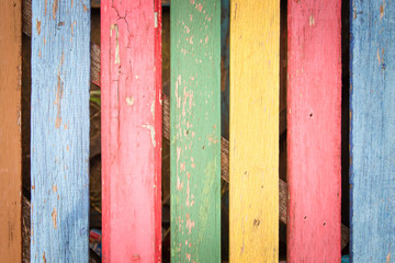 Multi colored painted wood background and alternative construction material, Vintage style texture on wooden table in modern restaurant, Retro seamless backdrop pattern pastel.