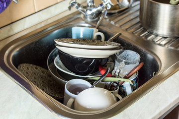 Sink with dirty dishes