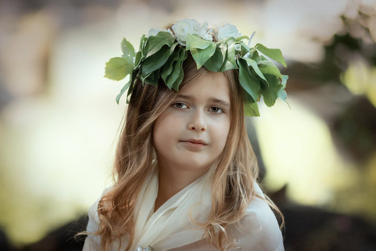 Portrait of a girl in the image of a forest nymph