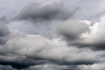 Beautiful view of natural meteorology background - stunning cloud scape, dramatic clouds floating across sky to weather change before summer rain.
