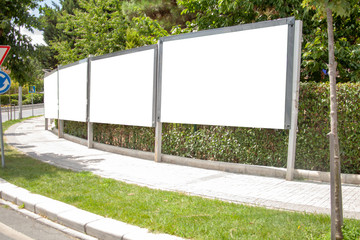 advertising board on asphalt road