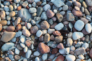 smooth colorful pebbles on the beach