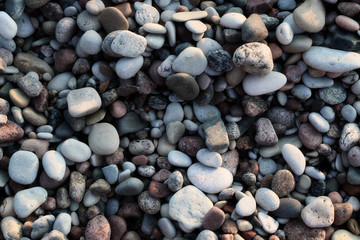 smooth colorful pebbles on the beach
