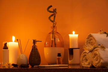 Warm toned SPA background with candles lit for aroma therapy, copy space