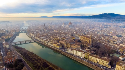 Obraz premium AERIAL. Panorama of the city of FLORENCE in Italy with the dome and Palazzo della Signoria and arno river