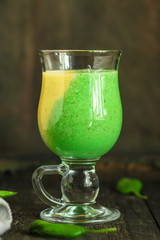 Smoothie, banana, avocado, chia seeds and more are healthy food concept. food background. top view