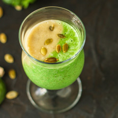 Smoothie, banana, avocado, chia seeds and more are healthy food concept. food background. top view