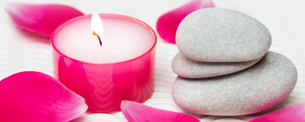 Wellness roses and candle with stones