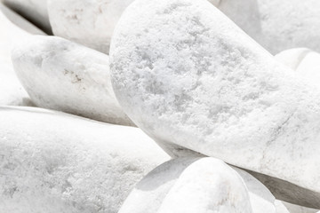 Close-up white large stone pile background. Natural environmental decorative material.