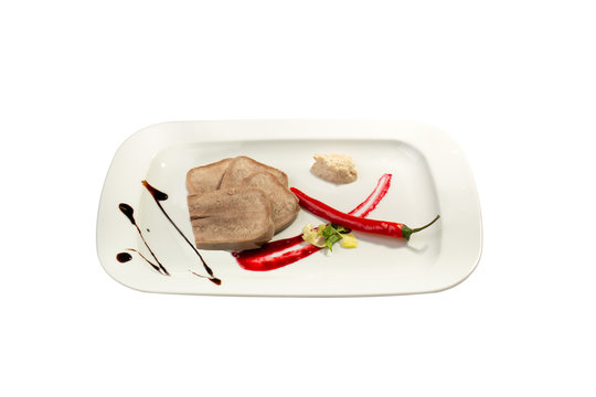 Beef tongue on the white background