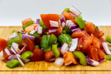 Colourful chopped vegetables on a wooden cutting board. Calgary, Alberta, Canada