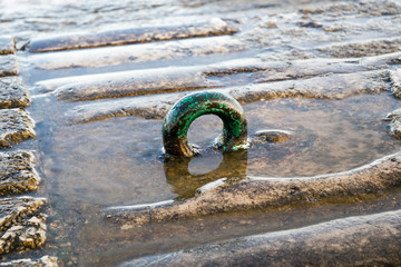 old ring to moor ships in the harbor
