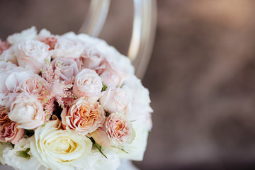 Wedding flowers, bridal bouquet closeup. Decoration made of roses, peonies and decorative plants, close-up, selective focus, nobody, objects
