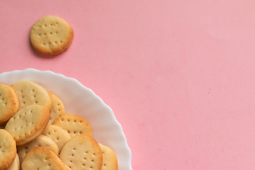 Sweet healthy homemade cookies on a white plate isolated, picture with space for text