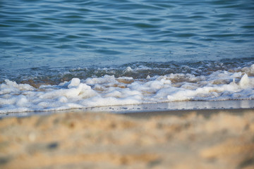 Sea view from beach with sunny sky