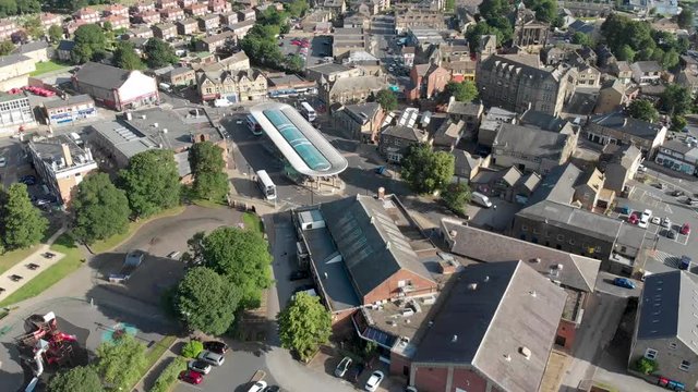 Aerial footage of the Leeds town of Pudsey in West Yorkshire, England showing typical British streets and business taken on a sunny bright summers day.