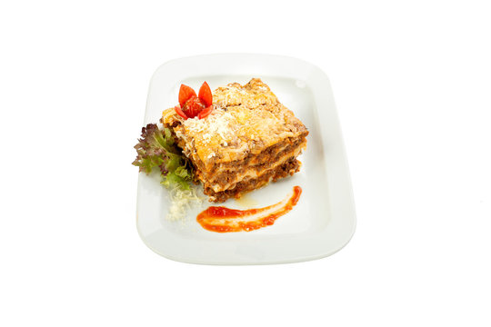 Lasagne on the white background