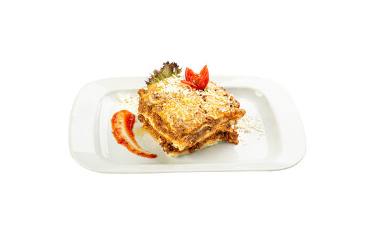 Lasagne on the white background