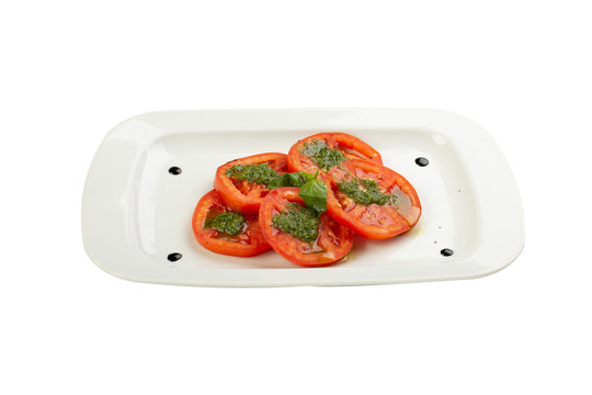 Marrows and tomato on the white background