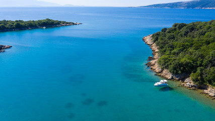 Fototapeta na wymiar aerial view in croatia, coast, boat and adriatic sea