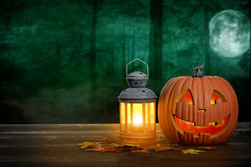 halloween pumpkin and lantern on wood table