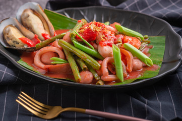 pink spicy seafood noodle Fried noodle with sea food and kale in gravy , Thai Food