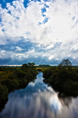 landscape with river and clouds