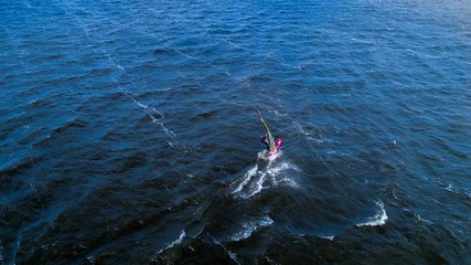 Aerial view of man making windsurf activity 