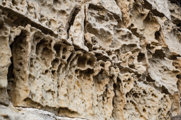 limestone bricks eroded and cracked
