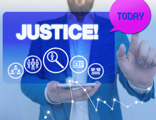Conceptual hand writing showing Justice. Concept meaning impartial adjustment of conflicting claims or assignments