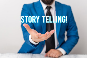 Text sign showing Storytelling. Business photo text activity writing stories for publishing them to public Man holds empty paper with copy space in front of him Copy Space