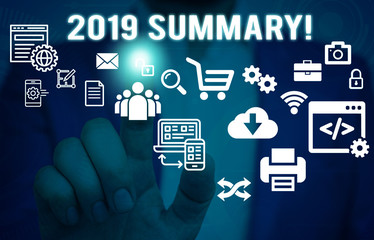 Word writing text 2019 Summary. Business photo showcasing summarizing past year events main actions or good shows Male human wear formal work suit presenting presentation using smart device