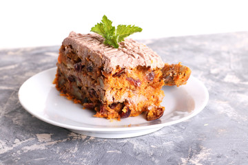 carrot cake decorated mint on a white plate