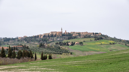 Fototapeta na wymiar City, hills and fields. Tuscany, Italy