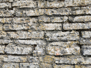Gray antique cracked brick wall texture background