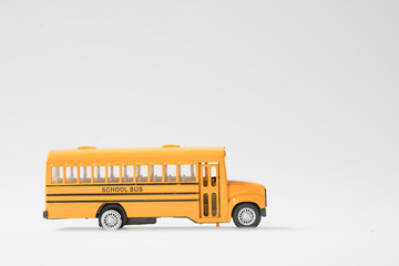 Yellow school bus with books, back to school concept, school ride to the bright future