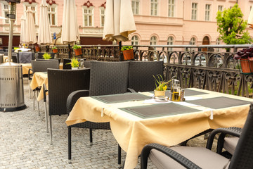 Fototapeta na wymiar Outdoor cafe with rattan furniture, Karlovy Vary