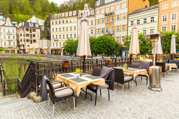 Cosy outdoor cafe with view on river, Karlovy Vary