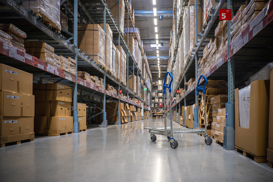 A Cart In Warehouse Aisle In An IKEA Store