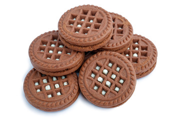 Brown chocolate milky cream filled cookies isolated