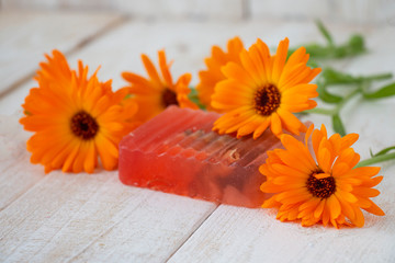 therapeutic aromatic soap from calendula tincture, with fresh calendula flowers