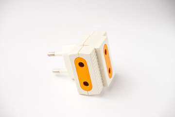 Triple Outlet Tap. Electric energy adapter used to split socket outlet. Isolated on white background.