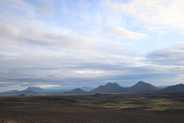Fototapeta na wymiar Plains with mountains on the horizon 