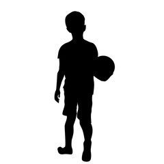 Obraz premium Silhouette of boy with ball