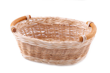 Empty wicker basket isolated on a white background