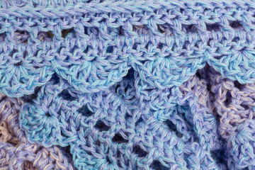 handmade multicolor crochet background with single crochet and double crochet stitches and chain stiches