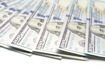 Five hundred dollars in hundred dollar bills on a white background. Frontal view.